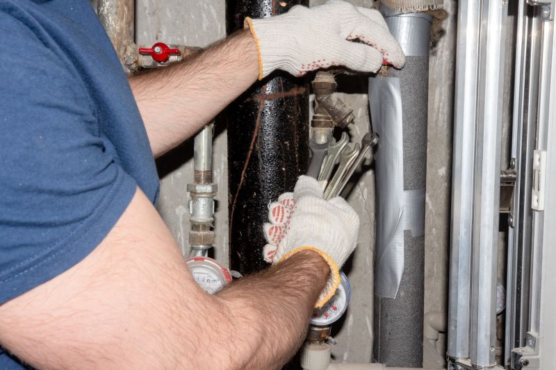 Plumber repairing a pipe